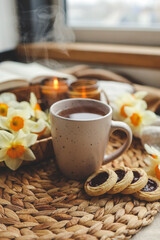 Cup of hot tea and spring home interior. good morning concept