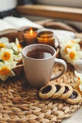 Cup of hot tea and spring home interior. good morning concept