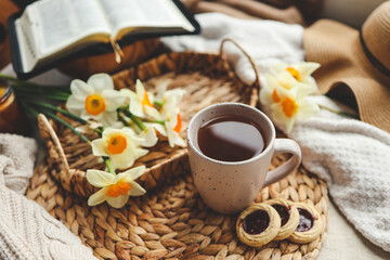 Bible, flowers, cup of tea. Christian good morning concept