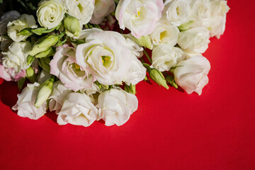 Composition with envelope and beautiful spring flowers.Spring invitation. Craft paper envelop. Happy birthday congratulation. copy space