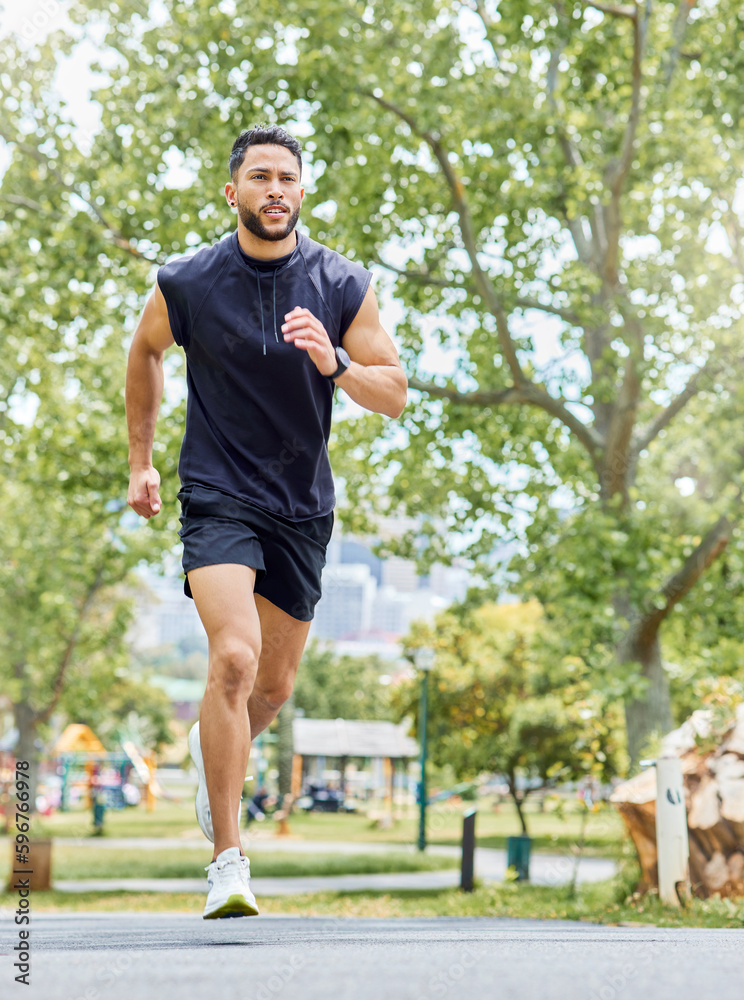 Poster Boost your day with a morning jog. Shot of a sporty young man running outdoors.