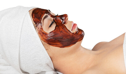 Chocolate Mask Facial Spa on young woman