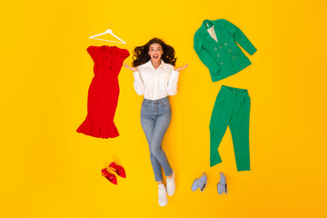 Excited Shopaholic Woman Advertising Shopping Offer Lying Over Yellow Background