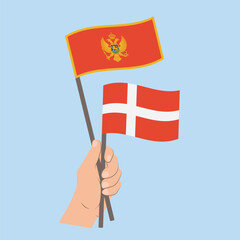 Flags of Montenegro and Denmark, Hand Holding flags