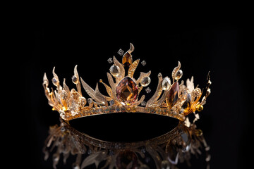 gold crown on black background