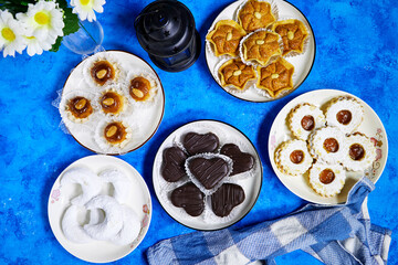 eid holiday table : Oriental Algerian sweet cookies named dziriettes and ( kaab el ghazal)...
