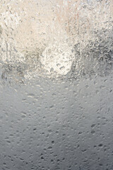 water drops on window from the inside