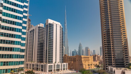 Fototapeta na wymiar Aerial panoramic view to Dubai downtown and difc skyscrapers all day timelapse.
