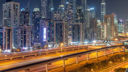 Fototapeta na wymiar Dubai marina tallest block of skyscrapers day to night timelapse.