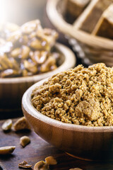 peanut flour, ground and dried peanuts used as a cooking ingredient, macro photography, typical food of the June festivities