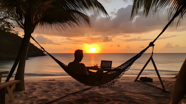 A digital nomad working while sitting in a hammock on a tropical beach with a beautiful sunset in the background. Generative Ai.