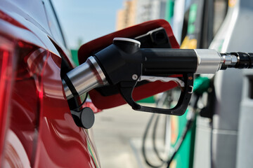 Compressed Natural Gas (GNC) pump fueling a car