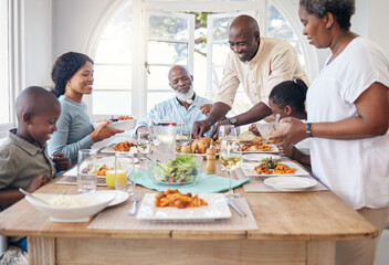 Families that eat together stay together. Shot of a family having lunch at home.