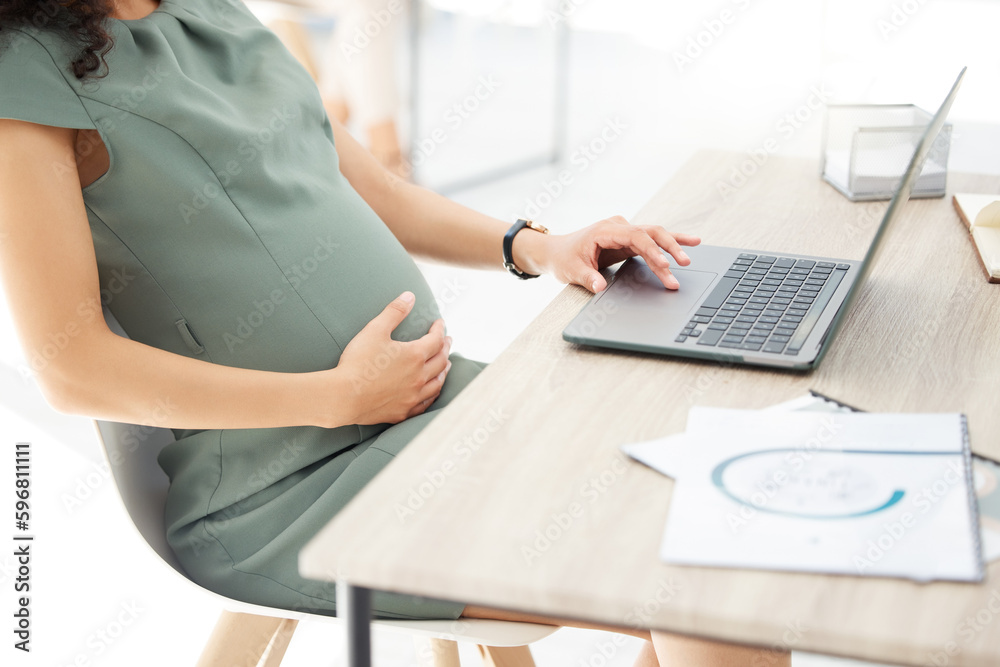 Aufkleber sorting all her tasks before maternity leave. closeup shot of a pregnant businesswoman working on a 