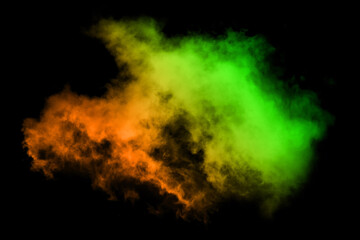 abstract powder splatted on black background,Freeze motion of color powder exploding throwing color...