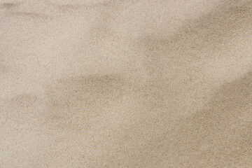 Fototapeta na wymiar Sand texture under sunlight