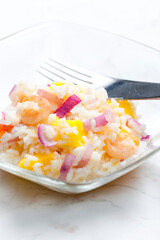 rice salad with shrimps, red onion and yellow pepper