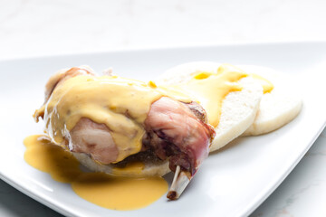 rabbit leg with cream sauce and dumplings
