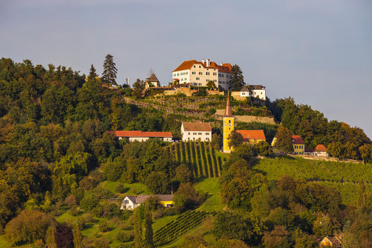Kapfenstein castle and church with vineyard, Styria, Austria