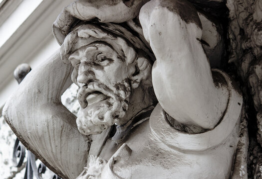Titan and Atlantean holds the world on his back. Greek mythology. (statue of the end of the eighteenth century)
