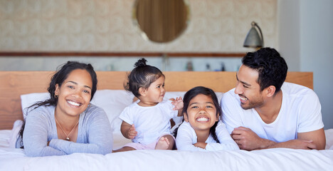 Family bed bonding daughter parent sister baby cute love house. Family bed bonding daughter parent...