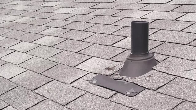 Rooftop vent pipe and shingles footage
