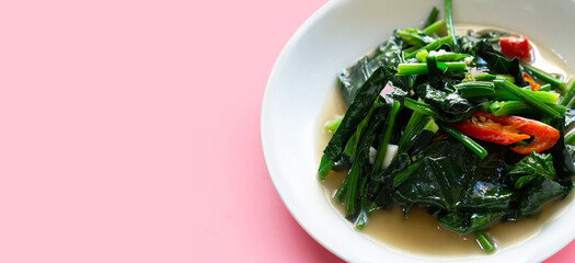 Spinach stir-fry with garlic. Asian food