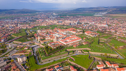 Aerial view of the Alba Carolina citadel located in Alba Iulia, Romania. The photography was shot from a drone with the camera  level for a panoramic view of the star shaped citadel.