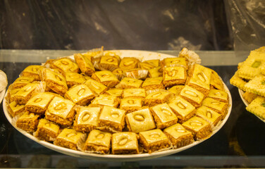 A plate of Morocco popular pastry with almond from Marrakesh local market.