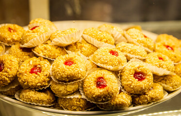 A plate of Morocco popular pastry with almond and honeyed berries from Marrakesh local market.