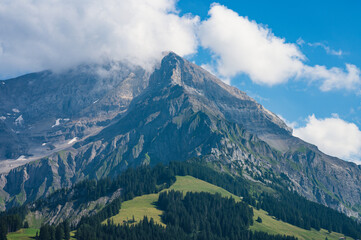 Fototapeta premium Adelboden, Switzerland - July 24, 2022 - Summer view of Adelboden village and city center
