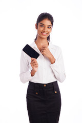 Young business woman posing with smartphone isolated on white.
