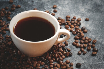 close up view of coffee seeds with coffee on dark surface cocoa textured grain group