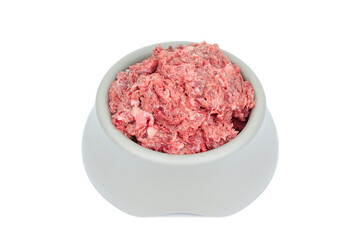 Natural dog food Raw minced meat in grey bowl isolated on white background Top view