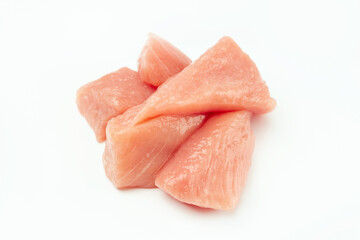 Fresh frozen pieces of turkey meat on a white background.Raw chicken.Frozen chicken fillet..Ogranic food and healthy eating.frozen turkey or poultry meat.
