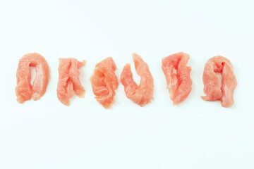 Fresh frozen pieces of turkey meat on a white background.Raw chicken.Frozen chicken fillet..Ogranic food and healthy eating.frozen turkey or poultry meat.