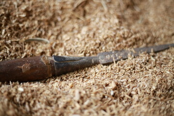 wood carving tools with sawdust