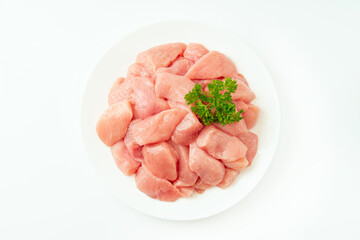 Fresh frozen pieces of turkey meat on a white background.Raw chicken.Frozen chicken fillet..Ogranic food and healthy eating.frozen turkey or poultry meat.