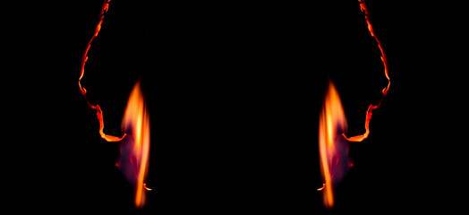 burning paper, glowing edge of paper on a black background