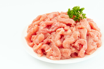 Fresh pieces of turkey meat on a white background.Ogranic food and healthy eating.Frozen chicken fillet.Raw chicken.