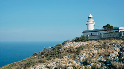 Lighthouse of Cabo de San Antonio in Javea. This lighthouse stands on the cliffs of the cape of the same name, 175 meters above sea level. In Javea, Alicante, Spain.