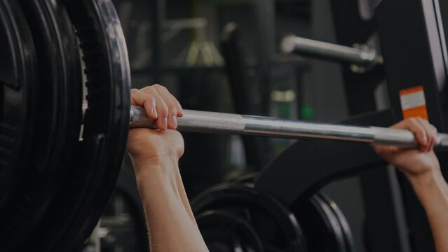 Machines Arms, Weight Bodybuilder, Arms Bench. Bodybuilder works on arms with weight machines and places emphasis on barbell bench presses.