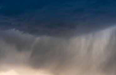 Fototapeta na wymiar Dramatic dark sky with thunderstorm clouds. Rain weather. Clouds storm background. 