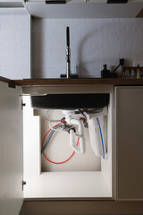 House water filtration system to drinkable condition, reverse osmosis. Installation or replacement...