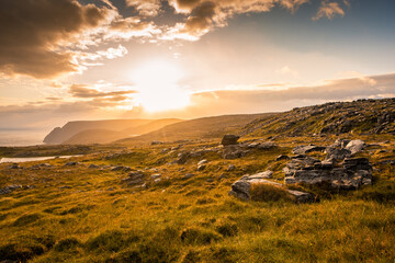 Midnight sun rising over Knivskjellodden, a trail in the tundra towards the true northernmost point...