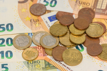 euro banknotes and coins top view 5
