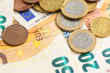 euro banknotes and coins top view 13