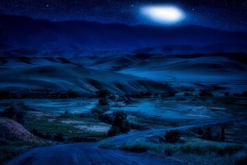 Fototapeta na wymiar kazakhstan landscape of steppe and stone mountains along the road at night with moon and falling stars