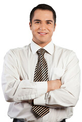 Happy businessman posing with arms folded