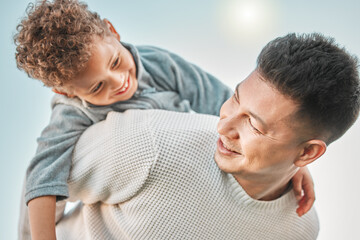 Always filled with love. Shot of a father and son having fun outside.